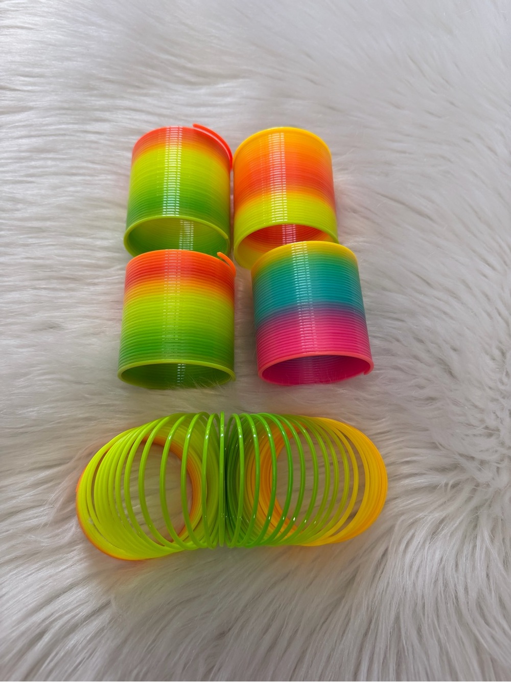 Four! Rainbow Slinky Toy
